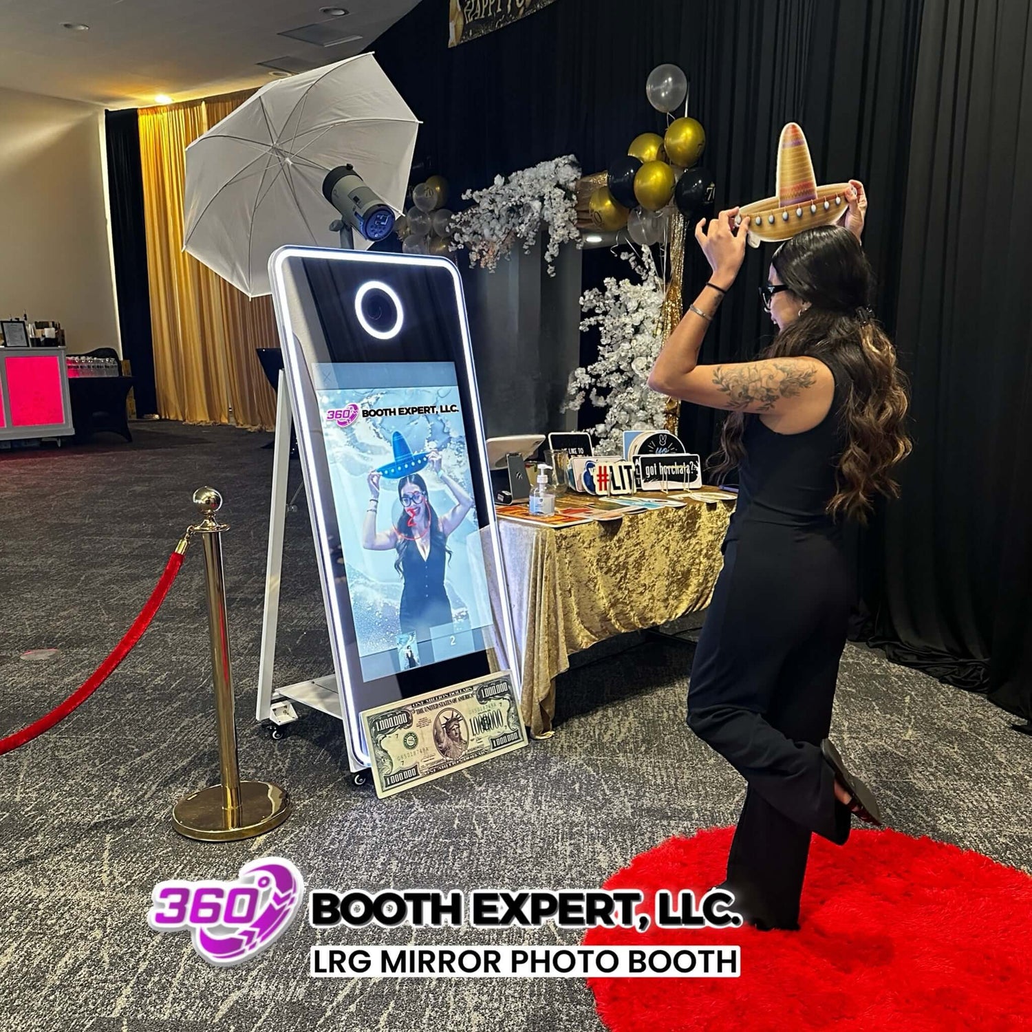 LRG mirror photo booth sale featuring a woman wearing a sombrero at a festive event.