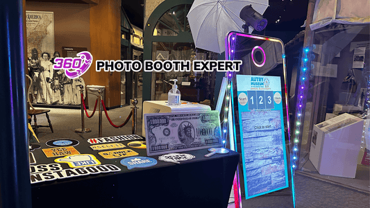 LRG mirror photo booth sale - interactive setup featuring props and illuminated screens for events.